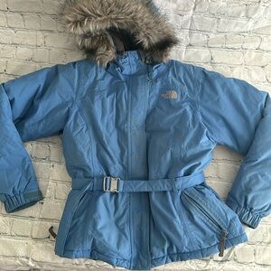 Womens preloved north face coat. Fur hood is detachable. Belt waist.